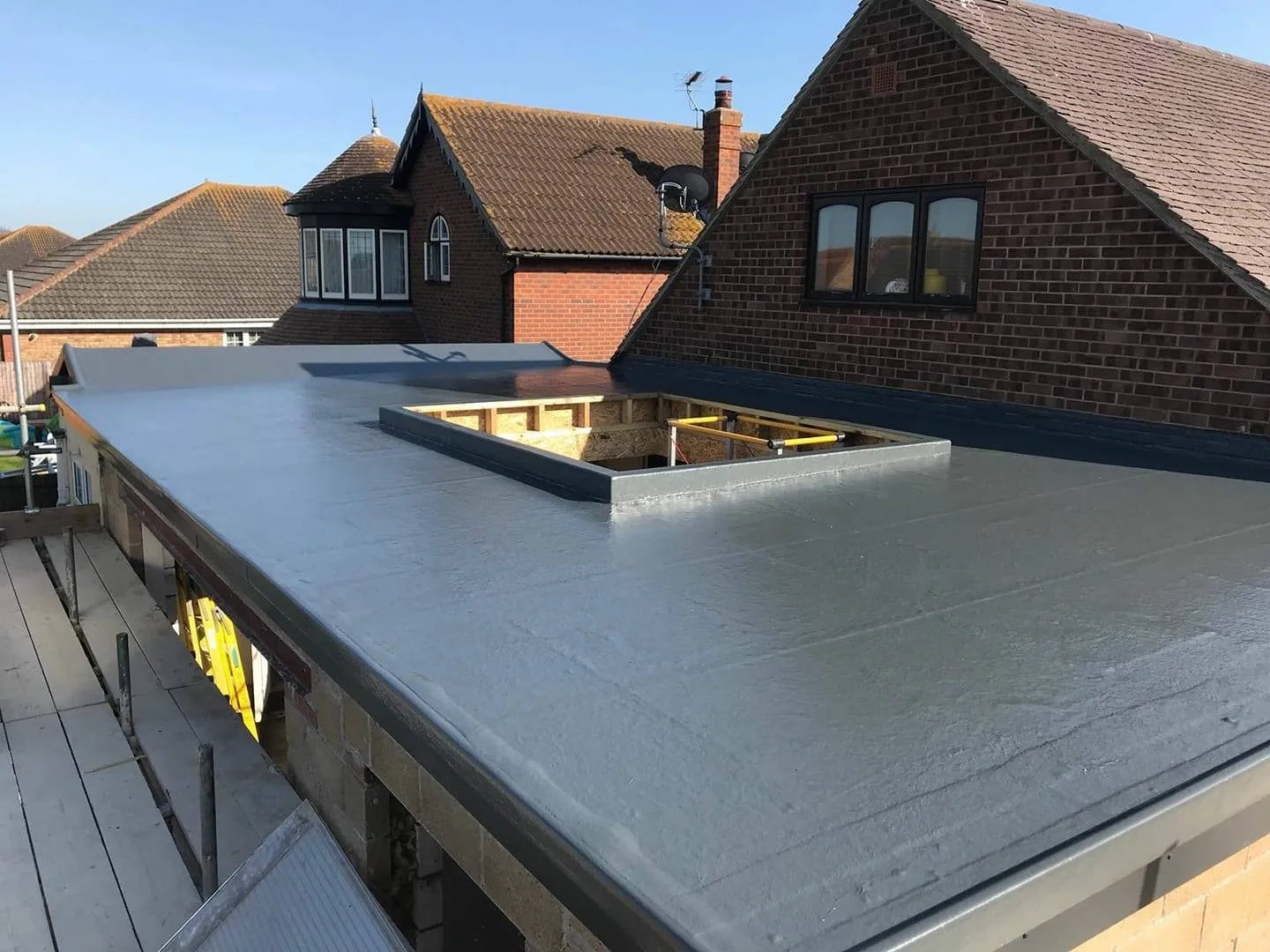 Completed EPDM rubber flat roof on a house extension